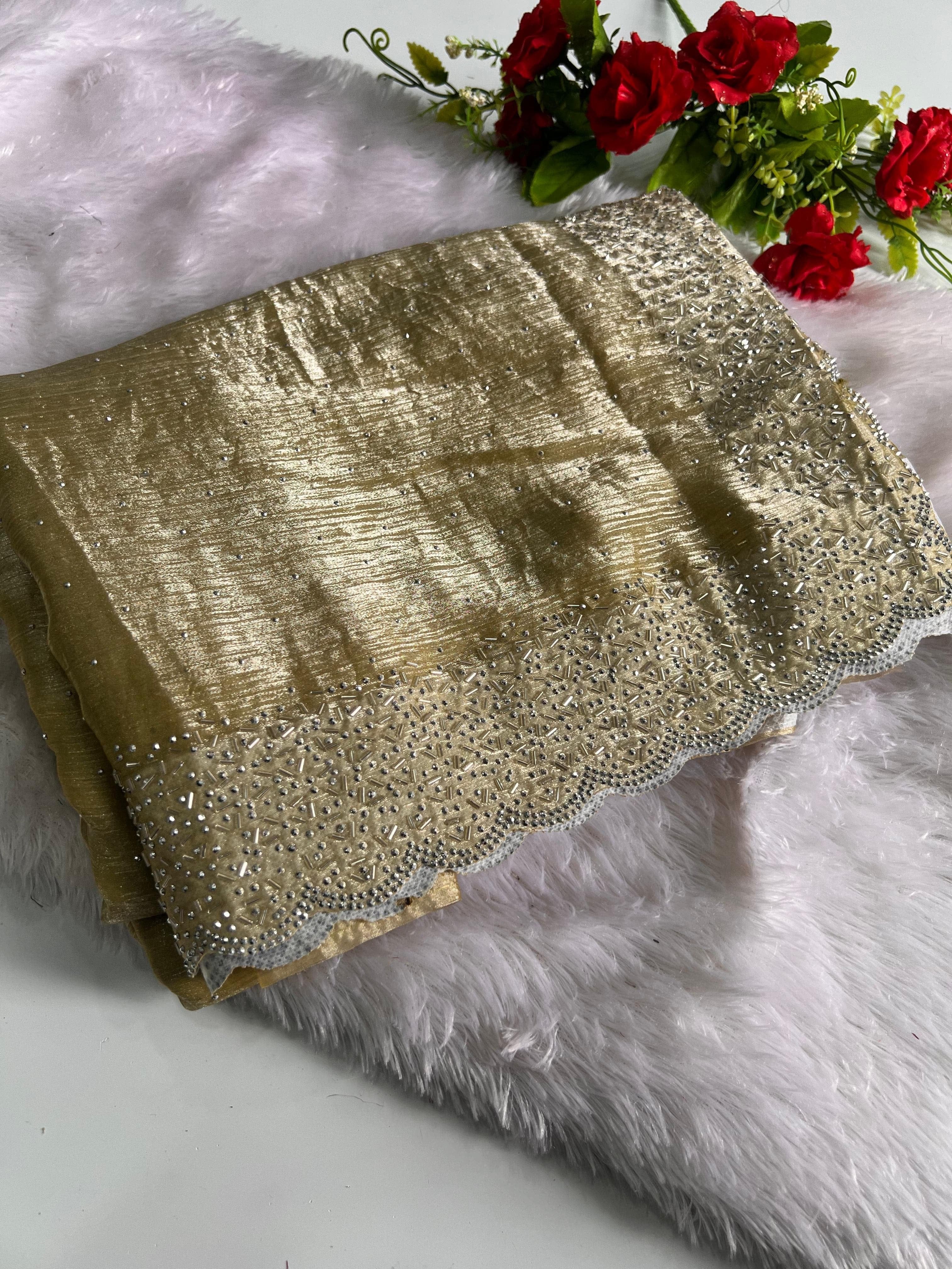 Kalki - Chiffon Saree adorned with delicate Jarkan work.