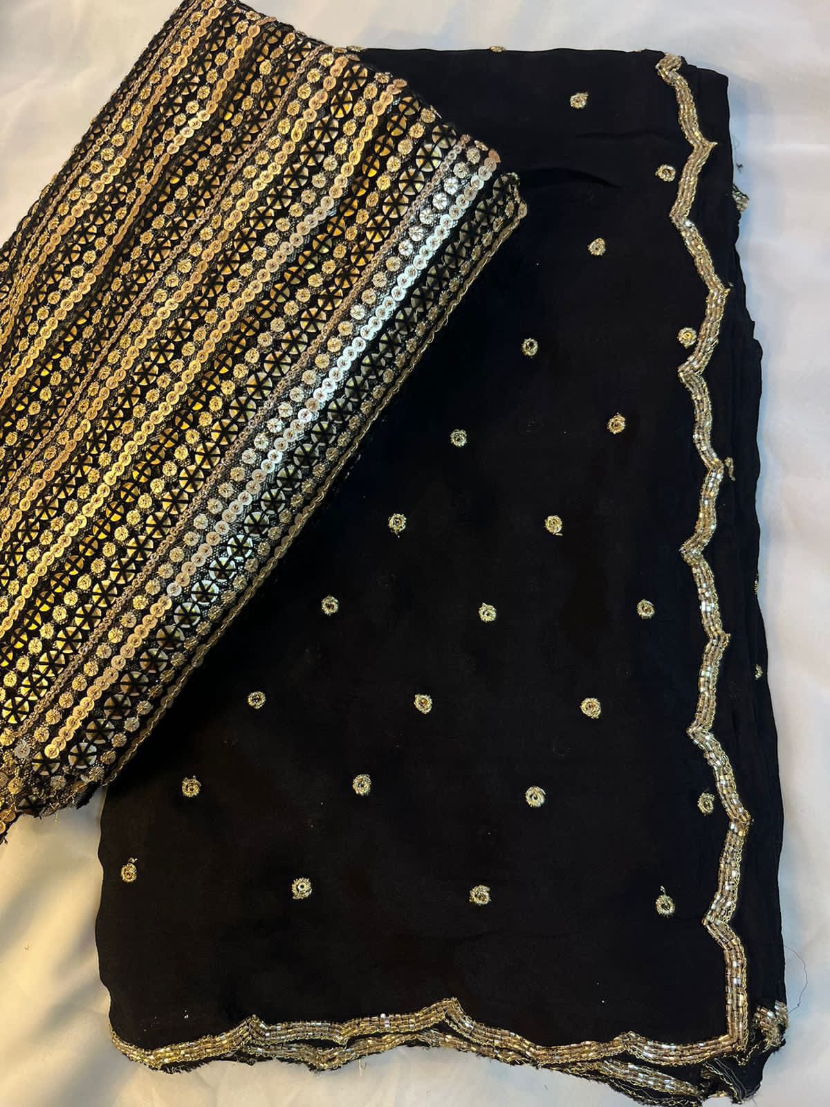 Arti - Black Pure Georgette Saree with Handwork.